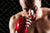 Fighter putting in a mouthguard