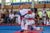 Two boys sparring in a karate match