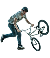 BMX rider wearing a mouthguard while performing a trick