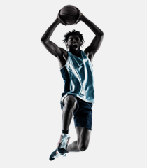 Basketball player jumping for a slam dunk